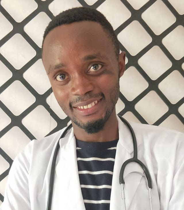 Goodluck in his doctors uniform